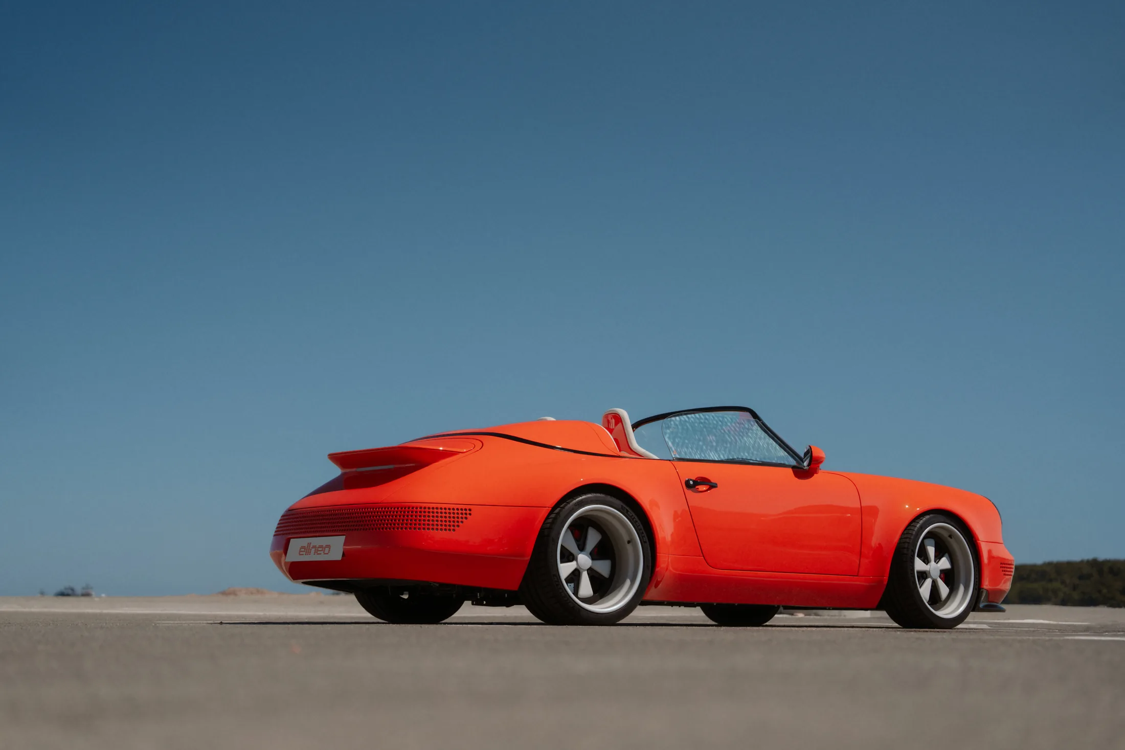 The Funkster in profile against a clear blue sky